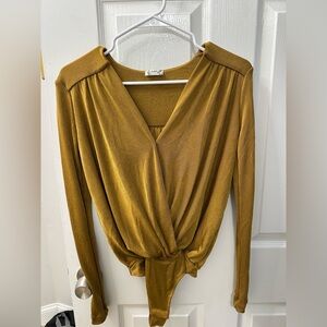 Free People Gold Blouse with Chic Design